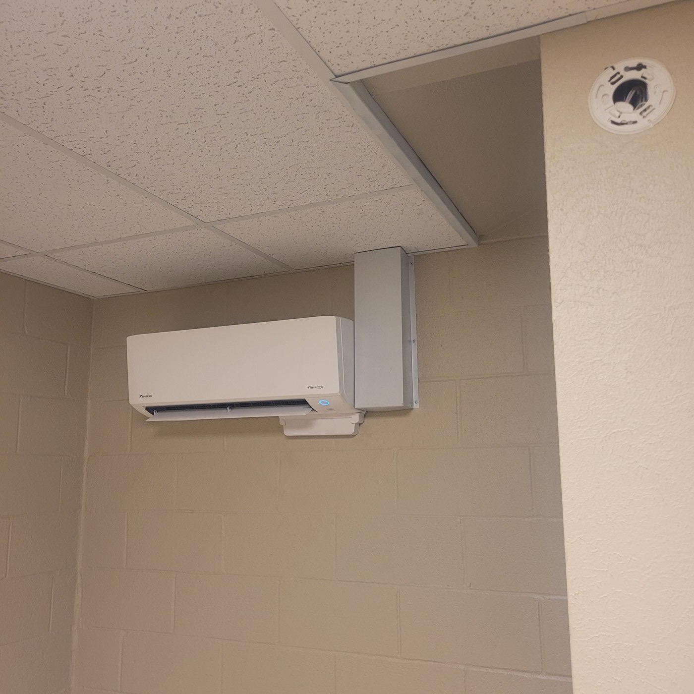 Completed Daikin mini split installation with line hide for bonus room