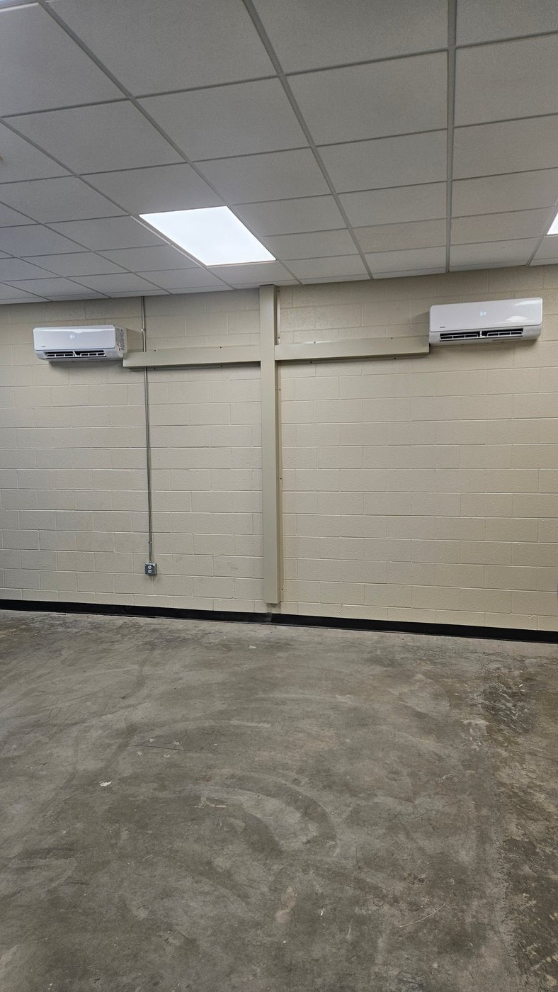 Two indoor mini split heads installed on commercial wall