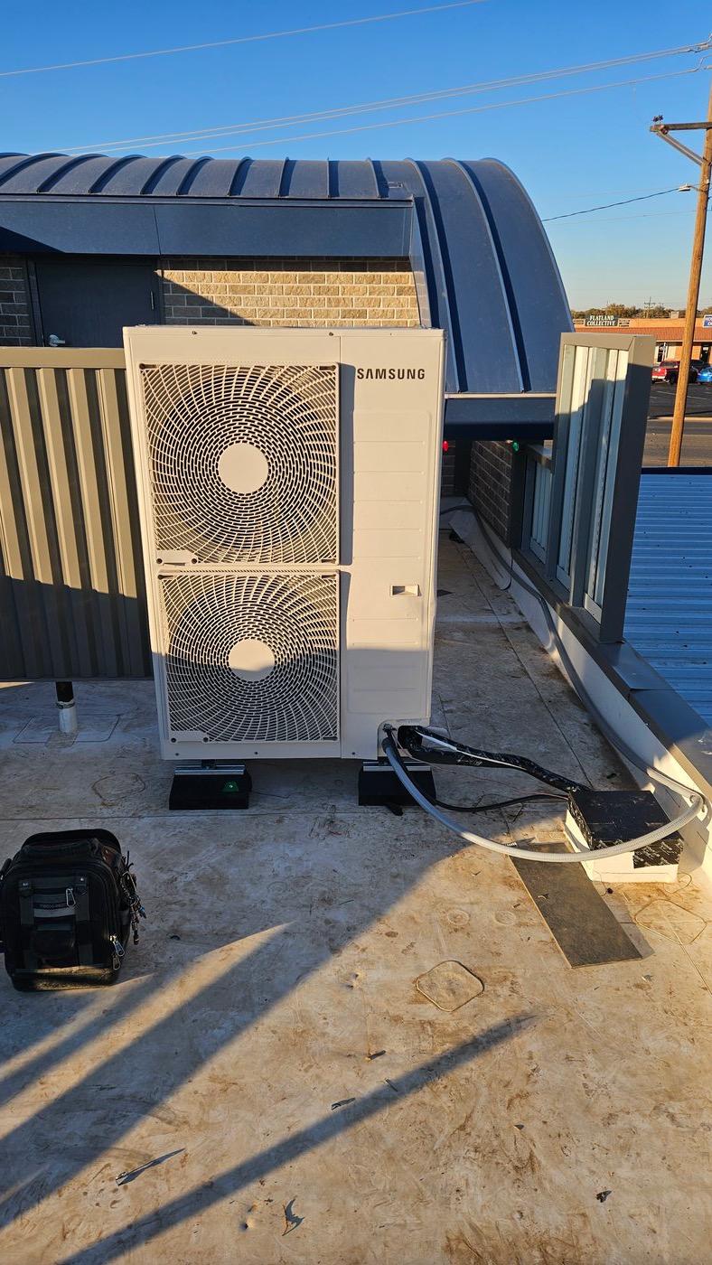 Samsung VRF multi-zone condenser on flat commercial roof