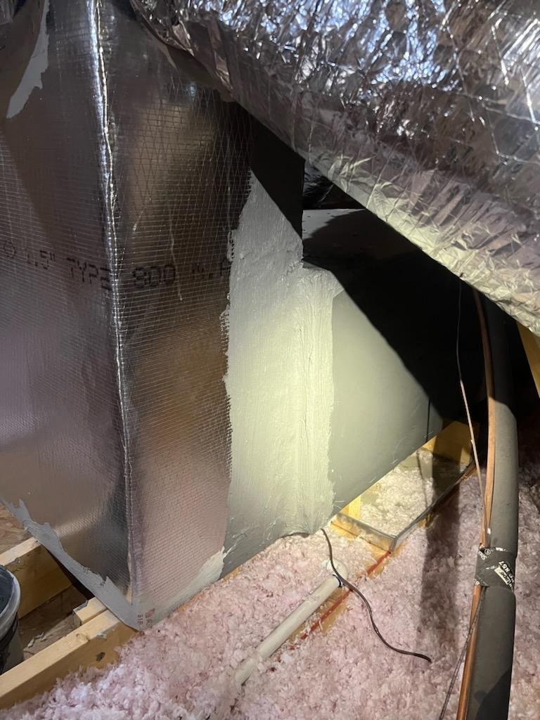 Well-maintained Kaden air handler in residential utility closet